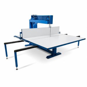 Vertical foam cutting machine with plain worktable
